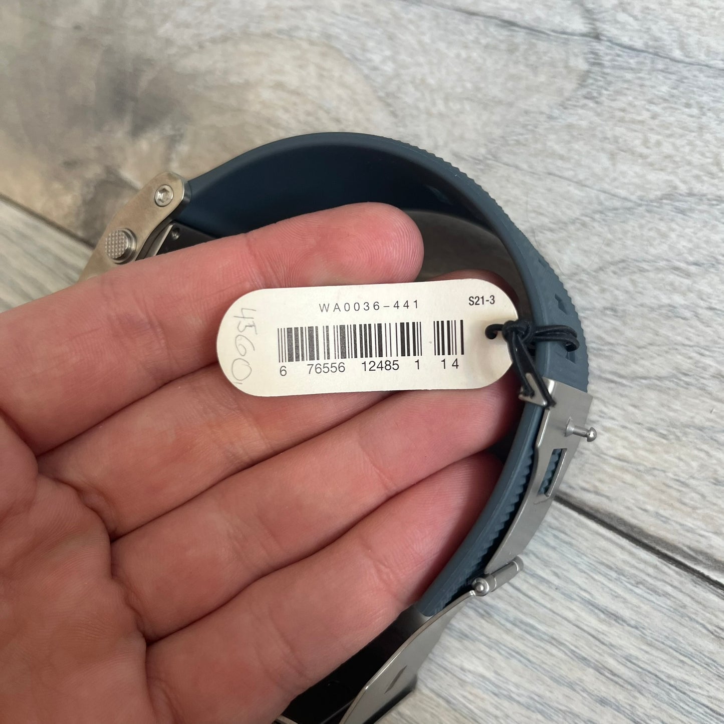 Nike Oregon Series Gray Digital Watch WA0036-441 is a digital wristwatch featuring a rectangular display with a stainless steel frame and a dark grey rubber strap with stainless steel clasp. The watch includes four side buttons, backlight function, and displays black digital numerals, with a small Nike logo on the metal bezel. It is water resistant up to 100 meters, powered by fresh batteries, and comes with original tag and box.