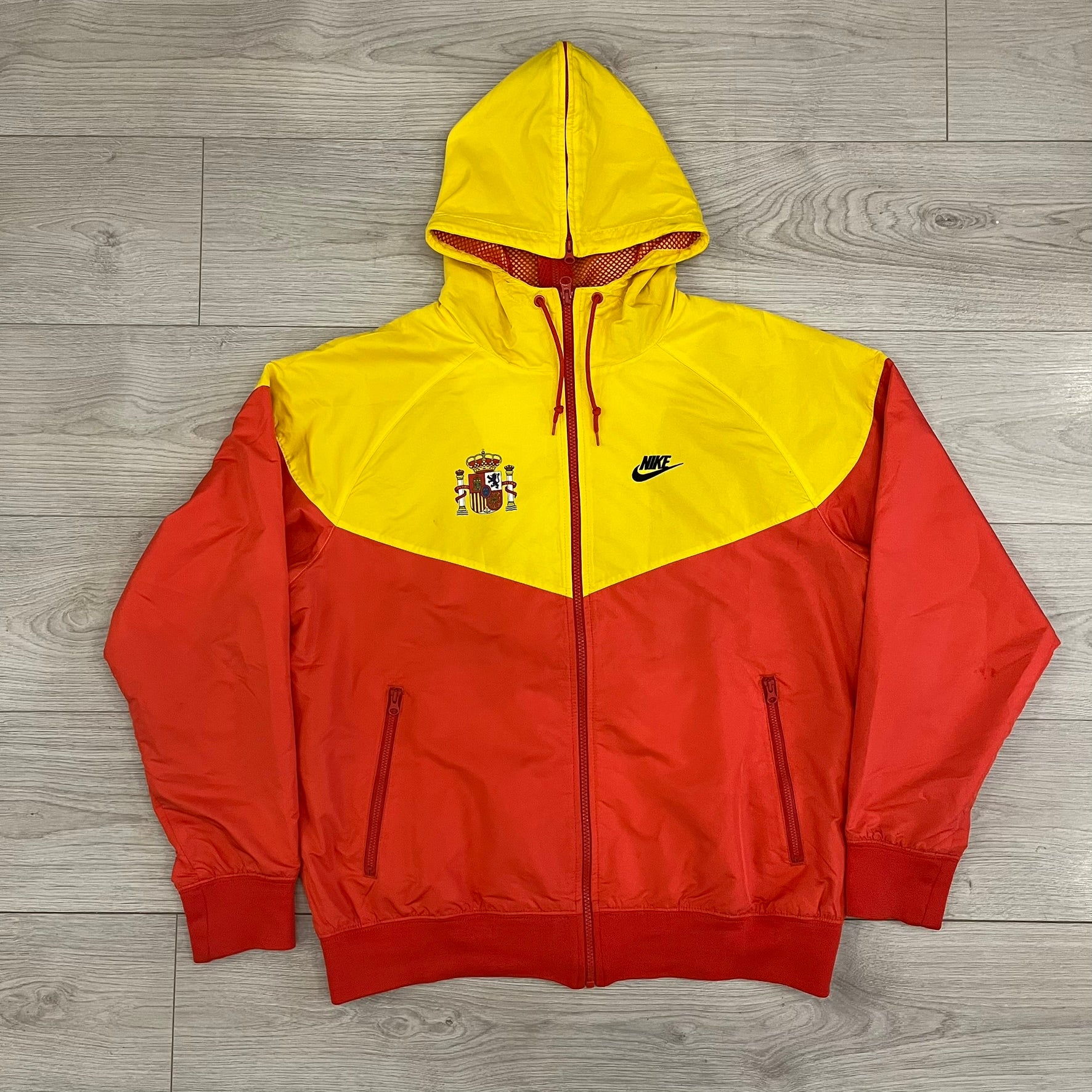 yellow nike wind breaker