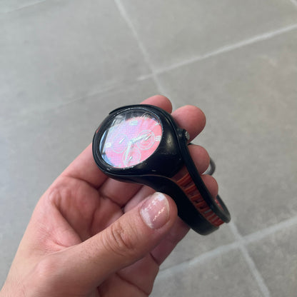 Nike Triax Swift 3i Red WR0091 Analog Watch comes with black &amp; red rubber straps and a black case featuring a red Nike Swoosh. The red metallic dial has a woven pattern, three silver subdials for day, date, and hour and silver hands. Seconds markings are printed on the inner edge of the case and are visible only at an angle. Sport-focused Triax case design with water-resistant construction.