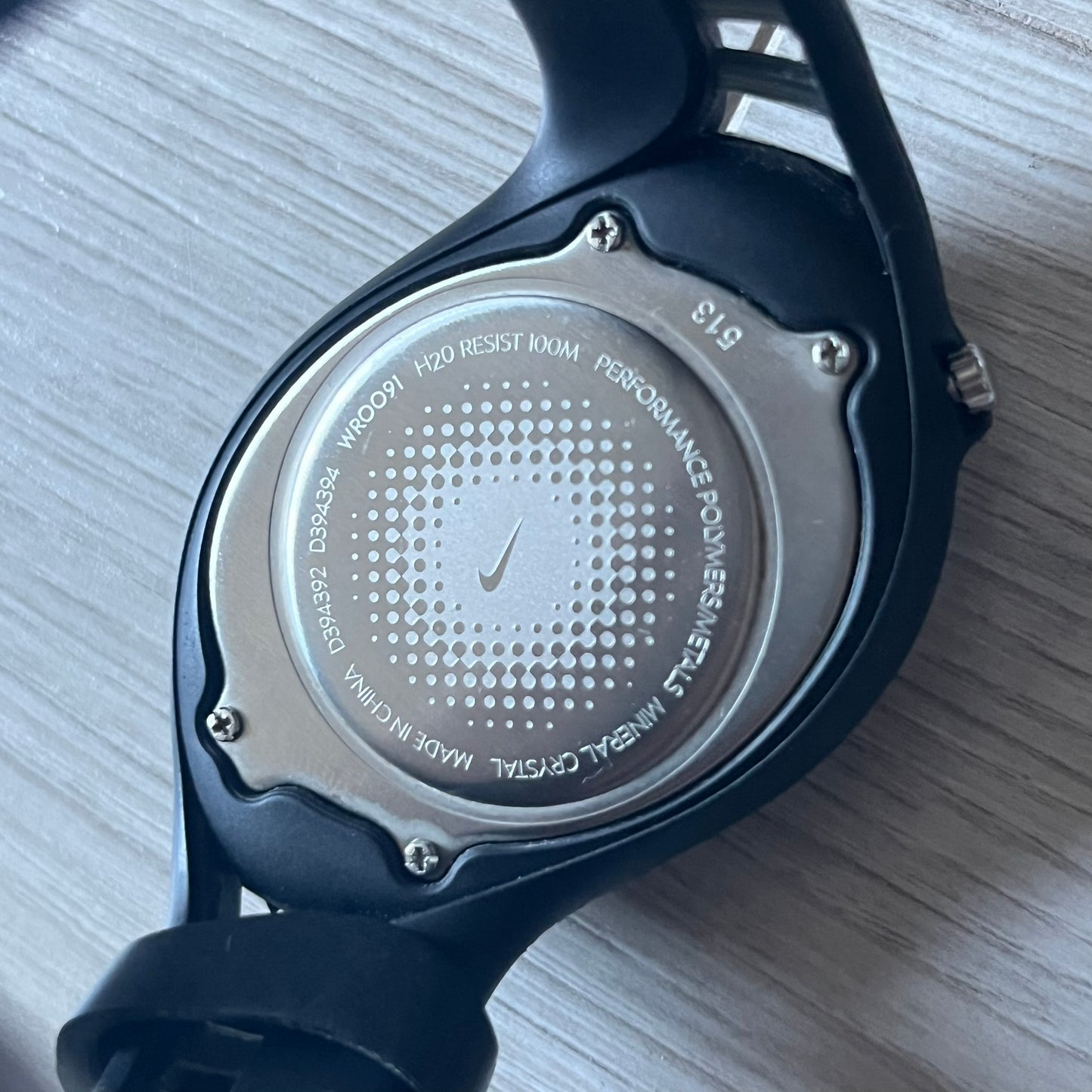 The Nike Triax Swift 3i WR0091 combines futuristic style with functionality. Fully blacked-out construction with silver accents, mineral crystal face and a striking oversized case. Includes day/date display and 100m water resistance. Comes with the original Nike Timing box/papers.