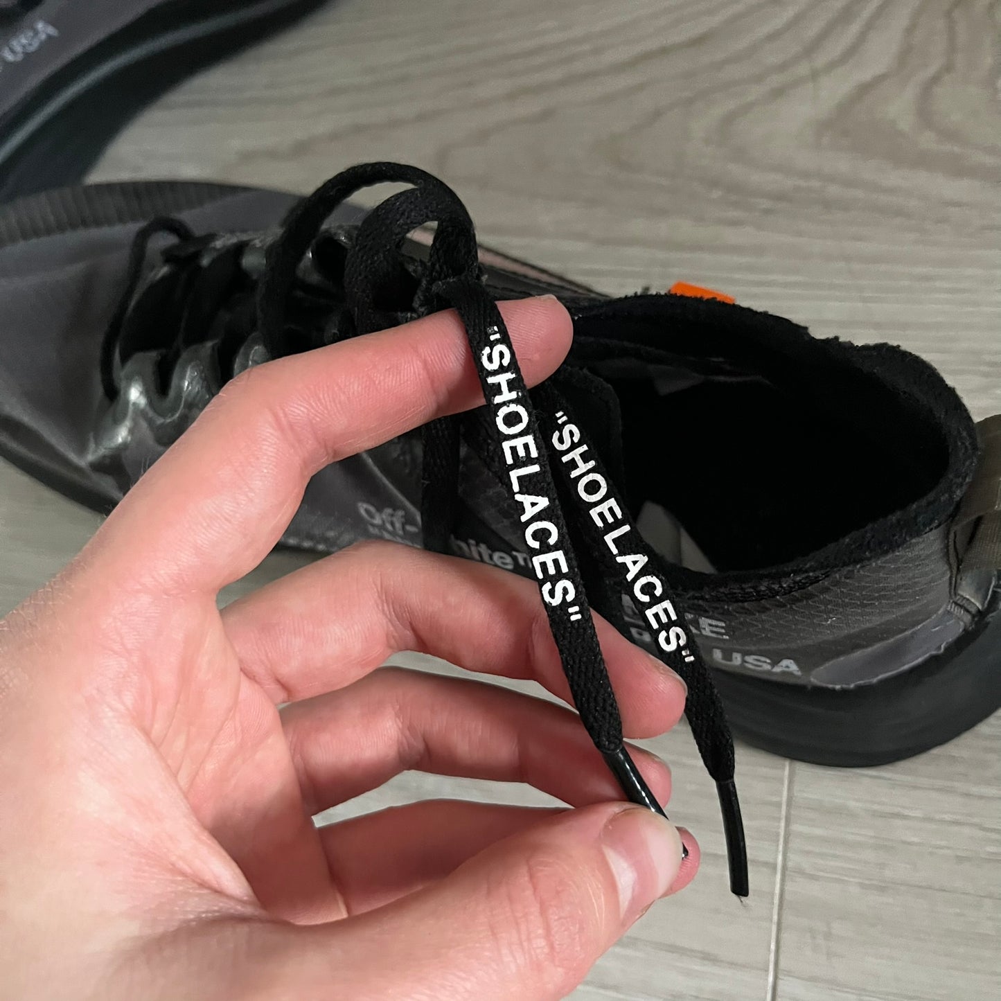 The Nike Zoom Fly Off-White Black Silver (AJ4588-001) reimagines Nike’s running silhouette through Virgil Abloh’s distinct Off-White lens. Built with a semi-translucent upper, black midsole, and bold white Swoosh, this 2018 release merges high-fashion design with advanced running technology.