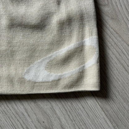 The Oakley Side Ellipse Beige Beanie is made from soft 100% acrylic and features a white tilted O ellipse logo on the side. Designed with a reversible construction for versatile use in changing conditions. A practical and understated piece from Oakley’s performance headwear line.