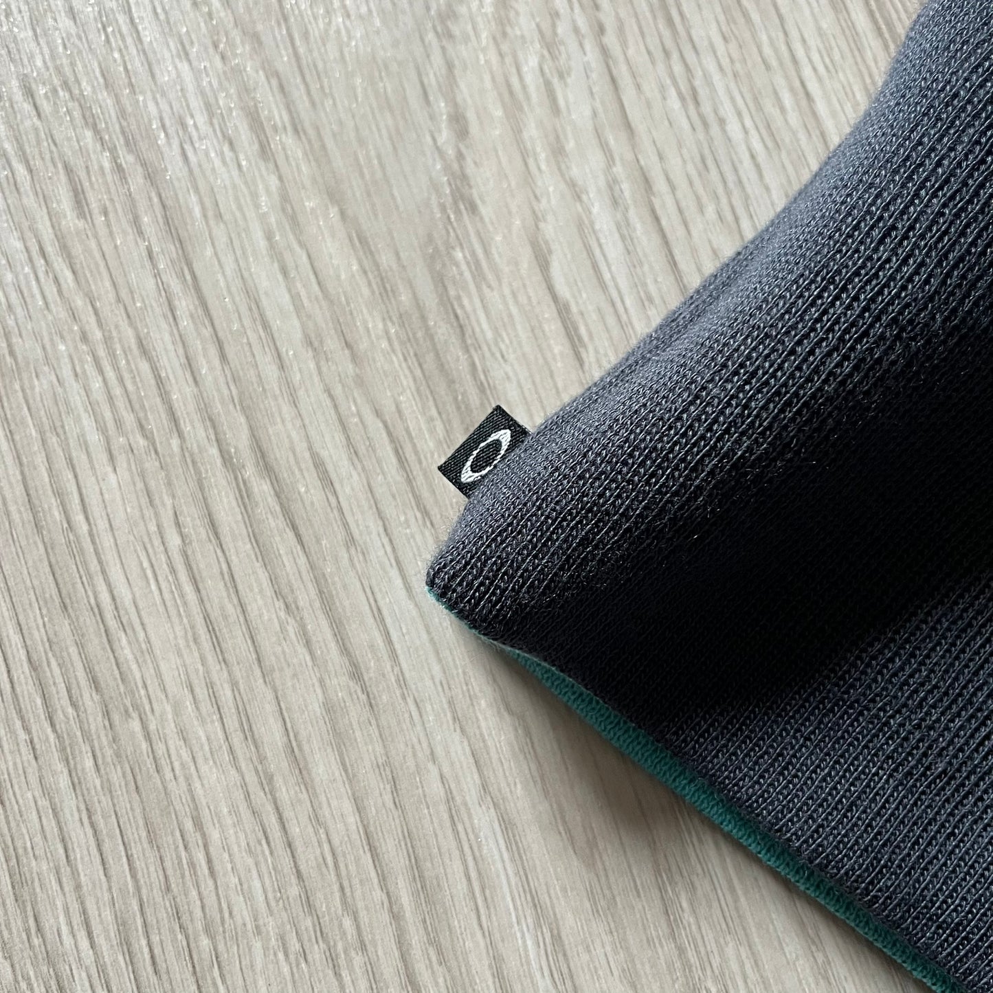 Oakley Turquoise Side Ellipse Beanie crafted from soft 100% acrylic fabric with a reversible two-sided build. Includes Oakley’s signature dark navy ellipse logo on the side. Designed for casual wear and outdoor performance with reliable warmth and fit.