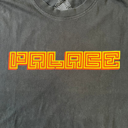 Palace FW18 Mazin Black Longsleeve features a black 100% cotton construction with a Palace logo printed on the chest. The logo is made from a maze-style graphic in yellow and red. Released on November 23, 2018.