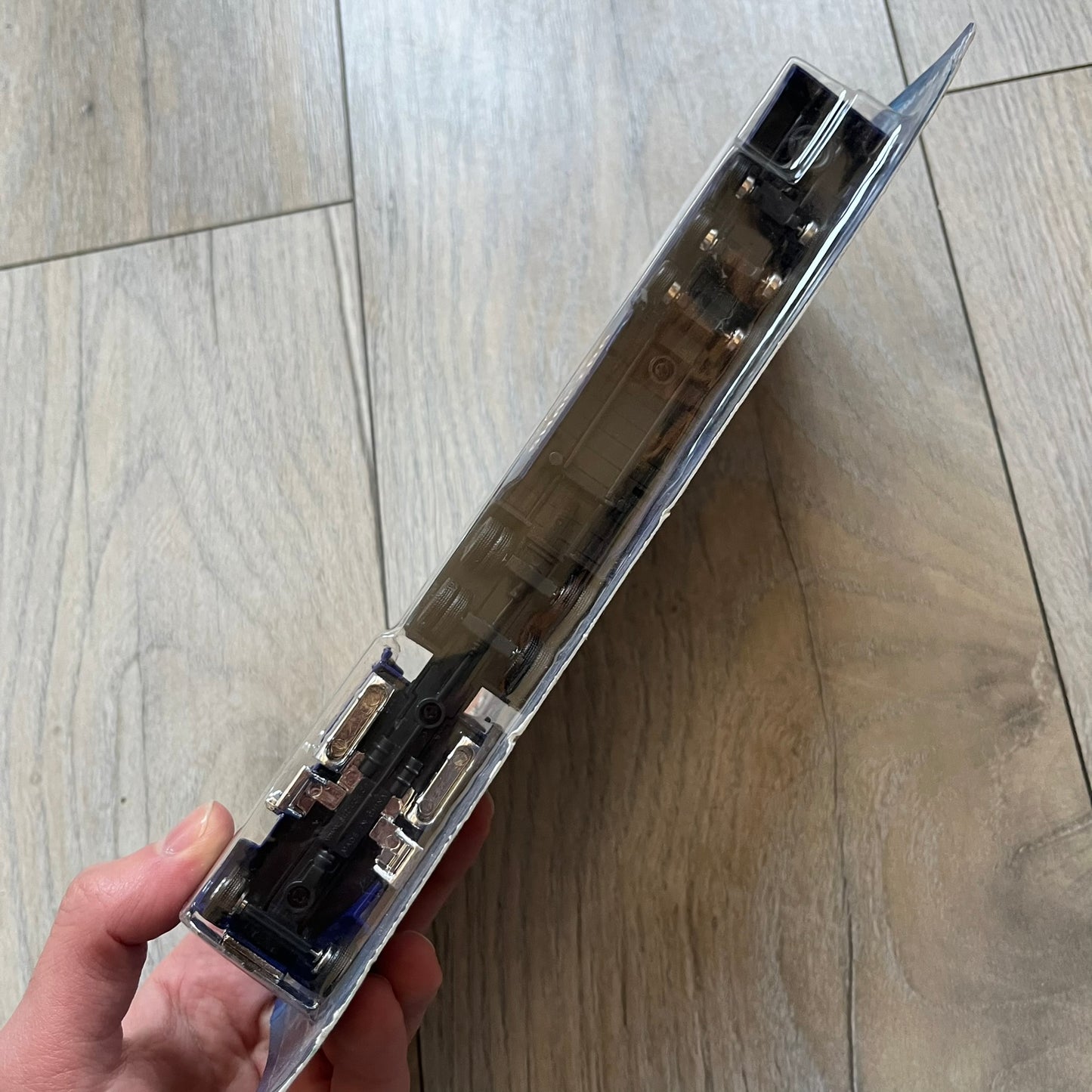 Pepsi 2000’s Shakira 1:87 Delivery Truck Model is a limited edition promotional model featuring a blue Pepsi delivery truck covered with graphics of Shakira alongside Pepsi logos and name text. The model remains in its original clear plastic display case attached to a printed cardboard backing with Pepsi and Shakira branding. This German edition promotional piece was produced as part of early 2000s Pepsi marketing campaigns.