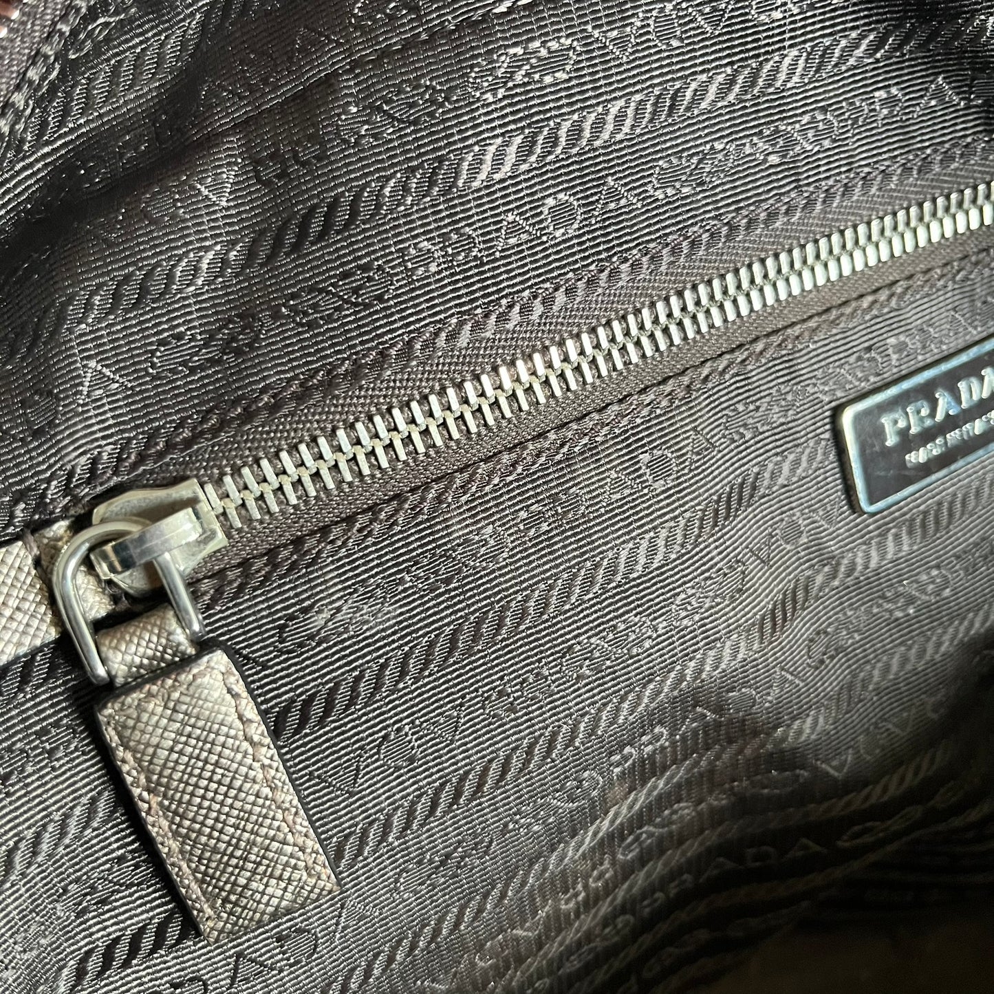 Vintage Prada Metallic Saffiano Bauletto Bag crafted from metallic gold saffiano leather embodies vintage elegance and modern luxury. Detailed with gold-tone hardware, dual handles, and original accessories, it’s a testament to Prada’s enduring craftsmanship. A collector’s piece made to shine on any occasion.