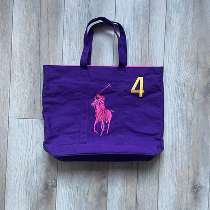 Ralph Lauren Purple &amp; Pink 4 thick tote bag with a large pink embroidered RL horse logo on the front. Yellow number "4" on the upper right. Interior is pink, made from a softer, smooth material. High-quality embroidery and sturdy exterior construction.