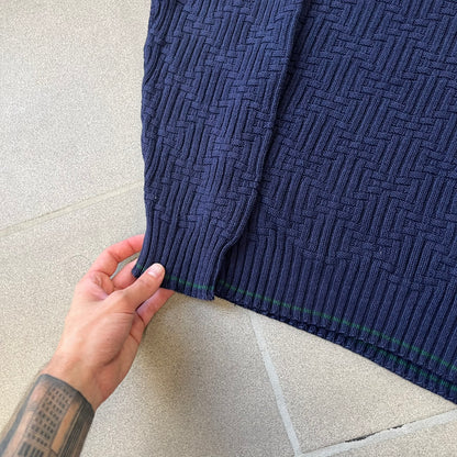 Sedgefield 1990's Basketweave Navy Sweater is a heavyweight navy sweater made in the USA, featuring a thin green line detail on the collar.
