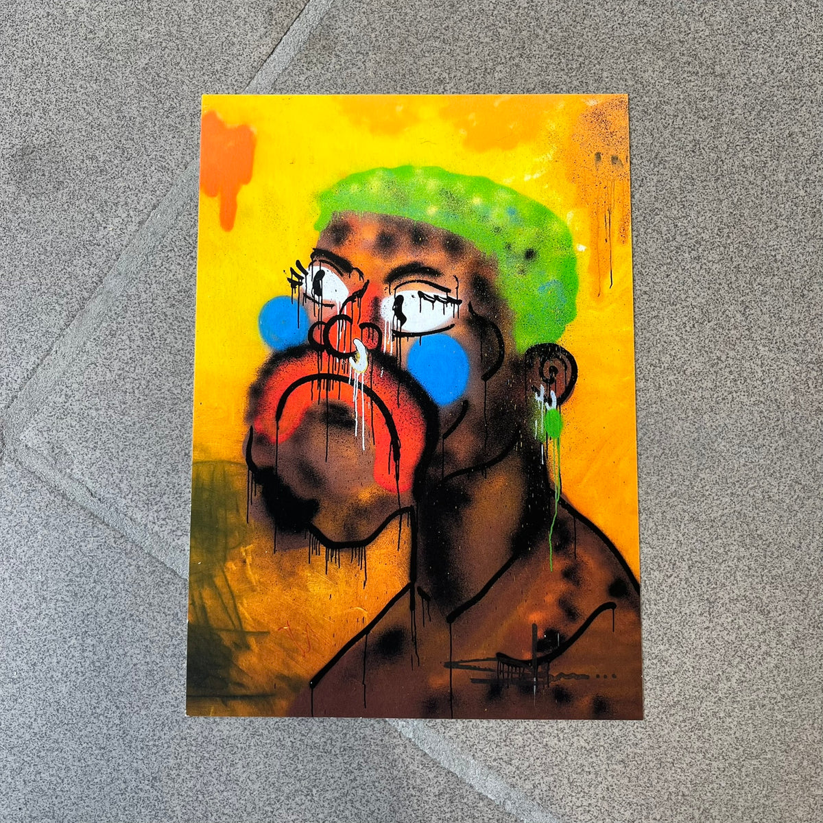 Slawn 2026 Rodman Print is a high-quality A5 print bought at a Rolex event featuring Slawn, showing a crying portrait of Dennis Rodman in Slawn's signature style against a yellow background. It carries Slawn's signature in the bottom right, with the original artwork painted in 2025.
