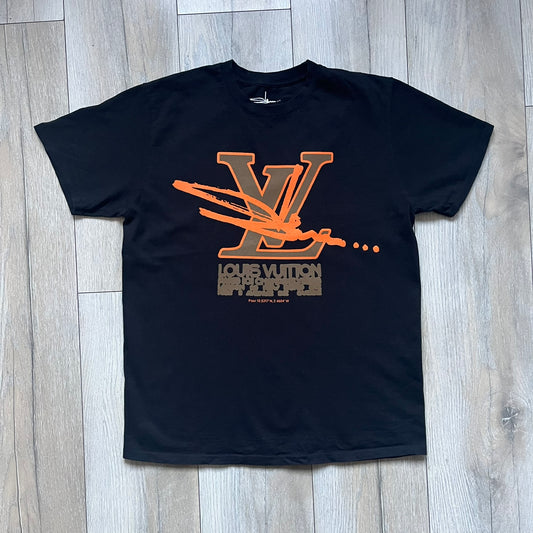 The Slawn LV Black Tee, given away at the Paris Pop-up in 2024, features a orange-brown LV logo on the front. Despite the branding, this is a Slawn creation, not an official Louis Vuitton piece.