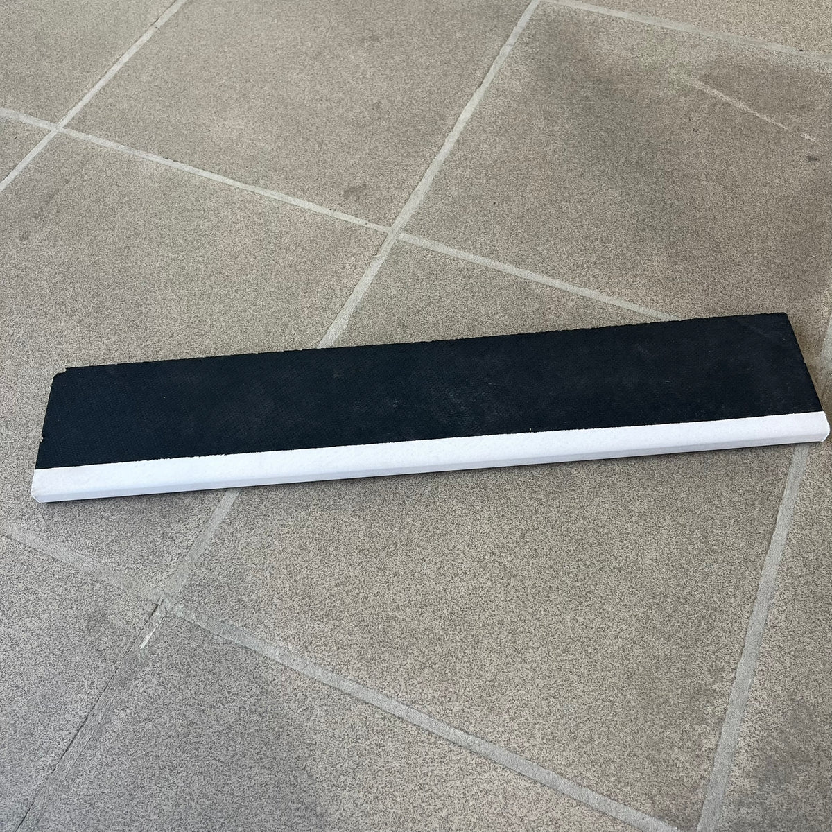 South Park 1998 Keyboard Wrist Rest is a thick foam wrist rest featuring the iconic bus stop scene with Cartman, Kenny, Stan, and Kyle kicking Ike. The design includes the wooden South Park sign and a small 1998 Comedy Central licensing mark, with a black base.