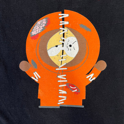 South Park 2009 “Oh My God, They Killed Kenny!” Tee is a black T-shirt made on a Fruit of the Loom blank. The front features a large graphic of Kyle with “Oh My God,” printed above and 2009 South Park licensing below. The back shows a stitched version of Kenny with “They Killed Kenny!” printed above the graphic.
