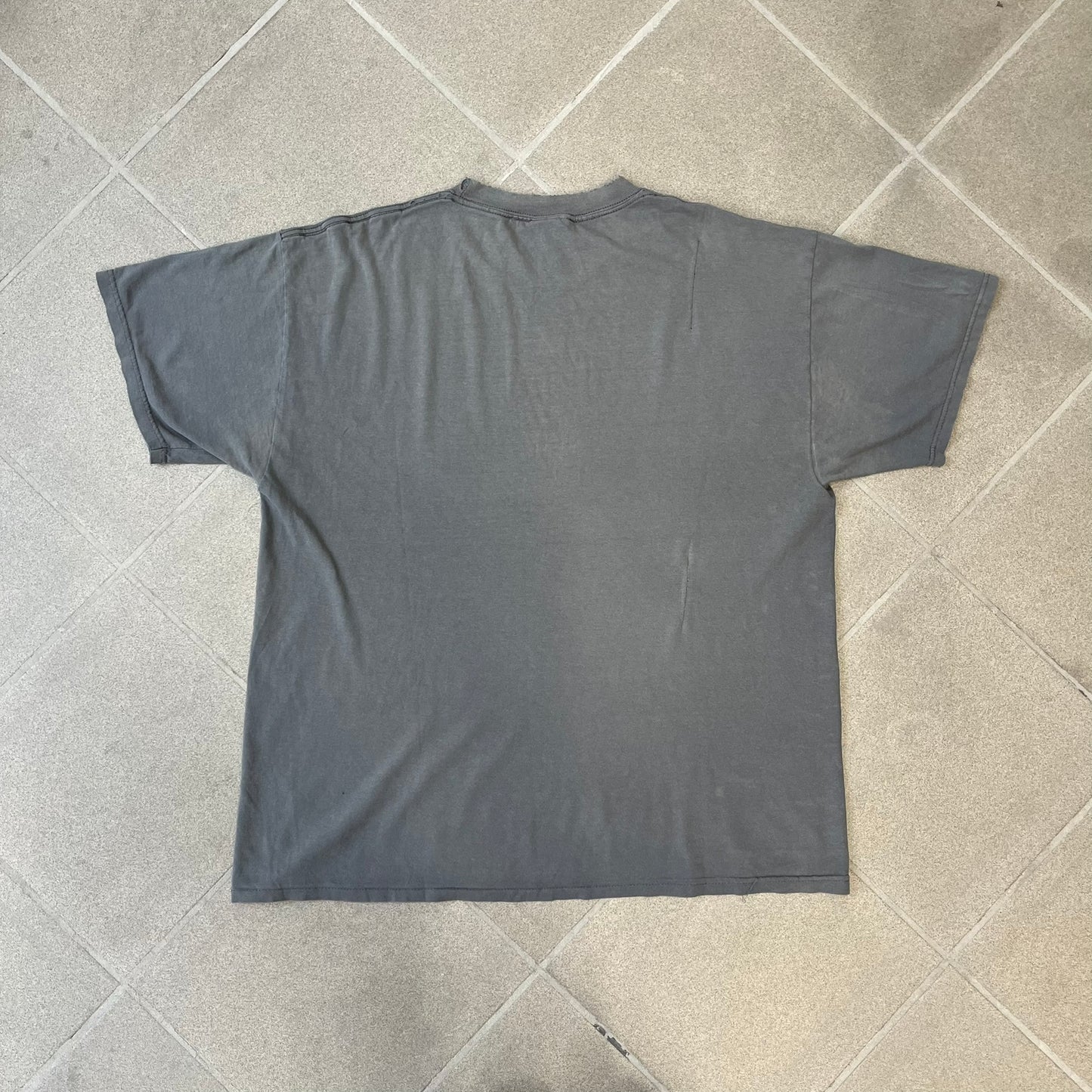 South Park 2009 “Respect My Authority” Gray Tee features a grey T-shirt with a front graphic of Cartman wearing a police uniform and running across a dotted cartoon-style background. Above the graphic is white and blue “Respect My Authority” text. The shirt has a South Park 2009 licensed neck tag and a heavily worn, distressed condition.
