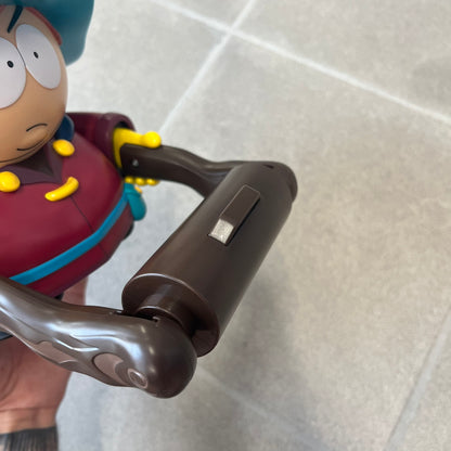 Unique South Park Snow Day exclusive featuring Grand Wizard Cartman as a talking toilet paper holder. The figure delivers iconic quotes while the roll turns, complete with a wooden-style holder design. A must-have collectible for South Park enthusiasts. No batteries!