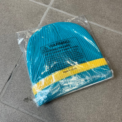 Exclusive South Park Snow Day Collector’s Edition Grand Wizard Cartman Beanie. Teal knit with yellow stripe detailing, embroidered yellow star with stitched effect, and official South Park branding tag. Made from a soft, stretchy material for a comfortable fit.