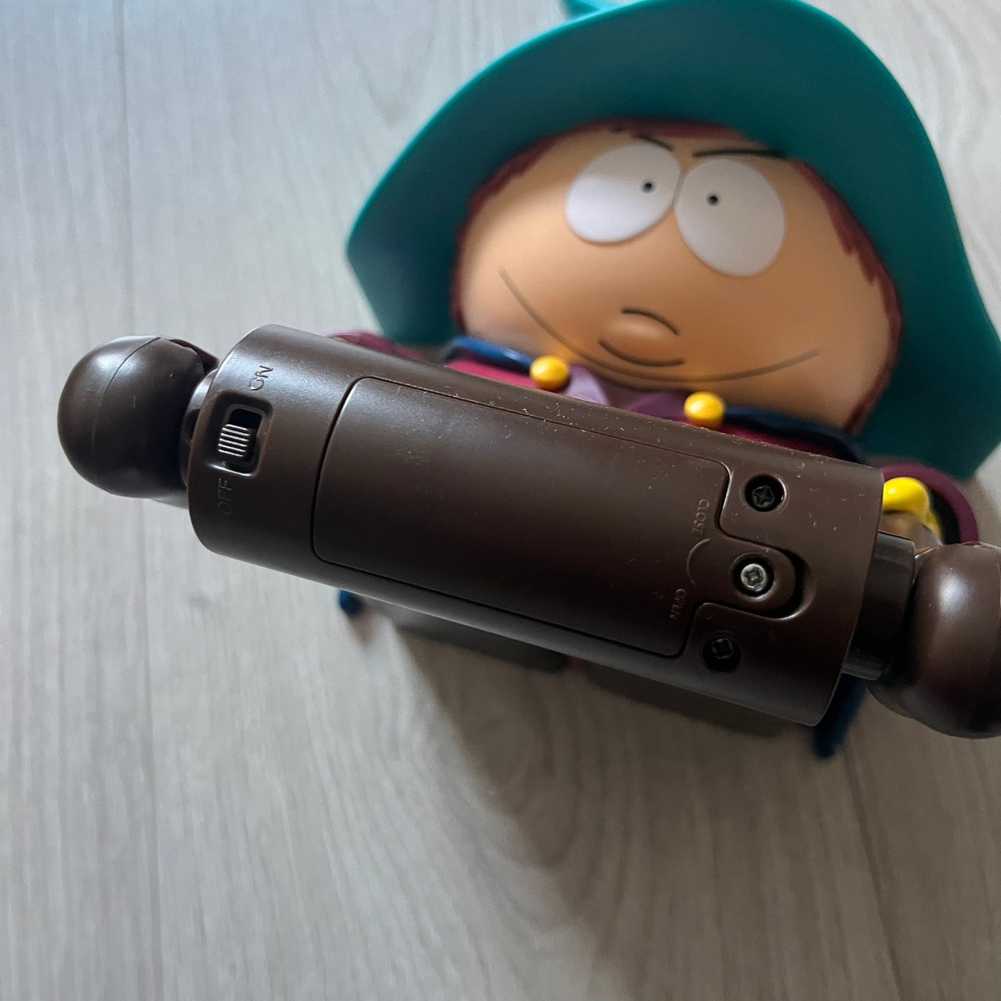 Unique South Park Snow Day exclusive featuring Grand Wizard Cartman as a talking toilet paper holder. The figure delivers iconic quotes while the roll turns, complete with a wooden-style holder design. A must-have collectible for South Park enthusiasts.