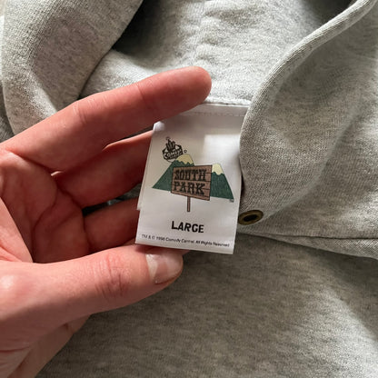 South Park “Stitched Up Kenny” Hoodie from 1998 in Gray, made on a Screen Stars blank. Features a small South Park logo on the chest and a large stitched-up Kenny graphic on the back. Vintage licensed piece from the show’s early era.