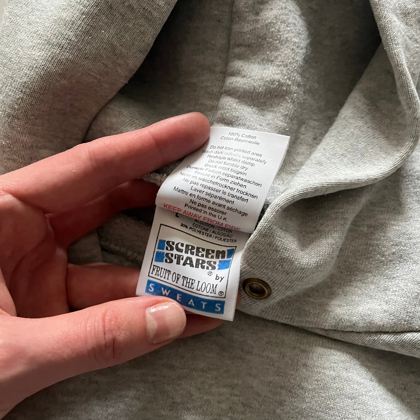 South Park “Stitched Up Kenny” Hoodie from 1998 in Gray, made on a Screen Stars blank. Features a small South Park logo on the chest and a large stitched-up Kenny graphic on the back. Vintage licensed piece from the show’s early era.