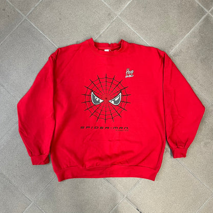 Spider-Man 2002 Hoop Cola Promo Red Crewneck is a rare Poland-exclusive crewneck made for the cross-promotional campaign between Hoop Cola and Warner Bros for the Spider-Man (2002) film. It was never sold in stores and was given out only as a prize in the SMS code contest. The cotton crewneck features web with eyes graphic in the middle, Spider-Man logo under and a Hoop Cola logo above.