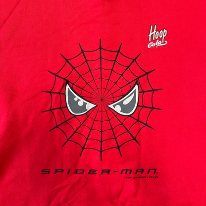 Spider-Man 2002 Hoop Cola Promo Red Crewneck is a rare Poland-exclusive crewneck made for the cross-promotional campaign between Hoop Cola and Warner Bros for the Spider-Man (2002) film. It was never sold in stores and was given out only as a prize in the SMS code contest. The cotton crewneck features web with eyes graphic in the middle, Spider-Man logo under and a Hoop Cola logo above.