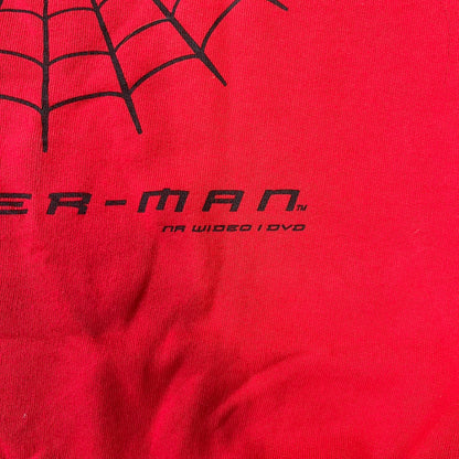 Spider-Man 2002 Hoop Cola Promo Red Crewneck is a rare Poland-exclusive crewneck made for the cross-promotional campaign between Hoop Cola and Warner Bros for the Spider-Man (2002) film. It was never sold in stores and was given out only as a prize in the SMS code contest. The cotton crewneck features web with eyes graphic in the middle, Spider-Man logo under and a Hoop Cola logo above.
