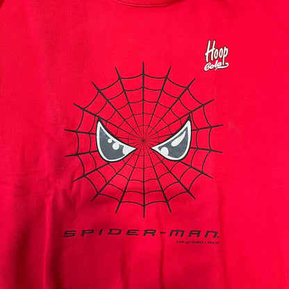 Spider-Man 2002 Hoop Cola Promo Red Crewneck is a rare Poland-exclusive crewneck made for the cross-promotional campaign between Hoop Cola and Warner Bros for the Spider-Man (2002) film. It was never sold in stores and was given out only as a prize in the SMS code contest. The cotton crewneck features web with eyes graphic in the middle, Spider-Man logo under and a Hoop Cola logo above.