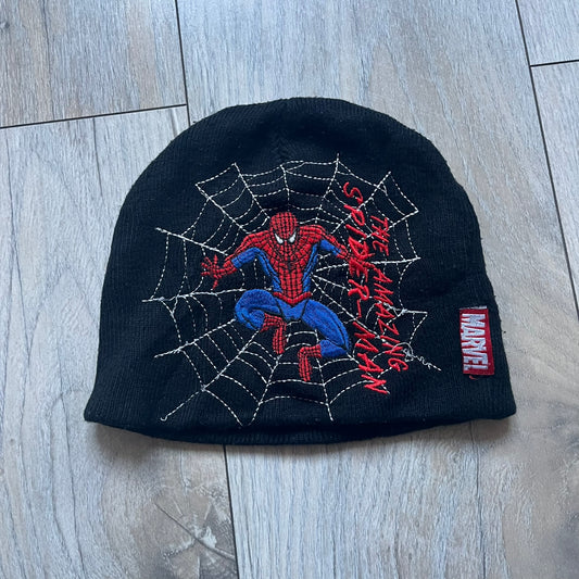 This vintage 2006 Spider-Man beanie by Contrast comes in black and features an embroidered design of Spider-Man on a web with “The Amazing Spider-Man” text. Officially licensed, it’s a nostalgic collectible that captures the mid-2000s comic and pop culture era.