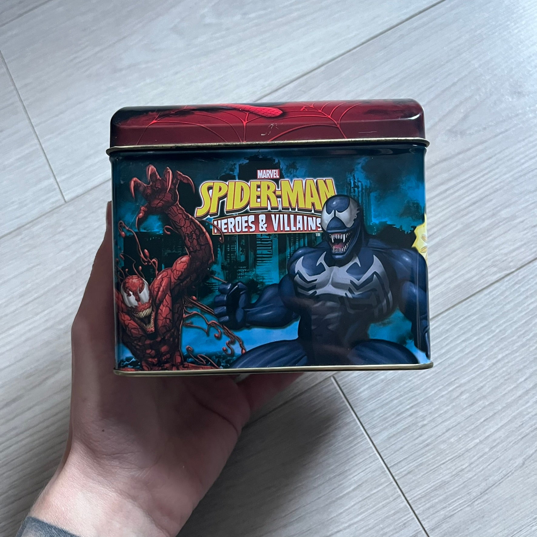 Spider-Man Heroes &amp; Villains 2008 Card Set includes 71 standard cards and 12 foil cards, stored in a collectible metal box. Originally sold with the Spider-Man Heroes &amp; Villains Collection magazine, these cards can be collected or used to play multiple official games.