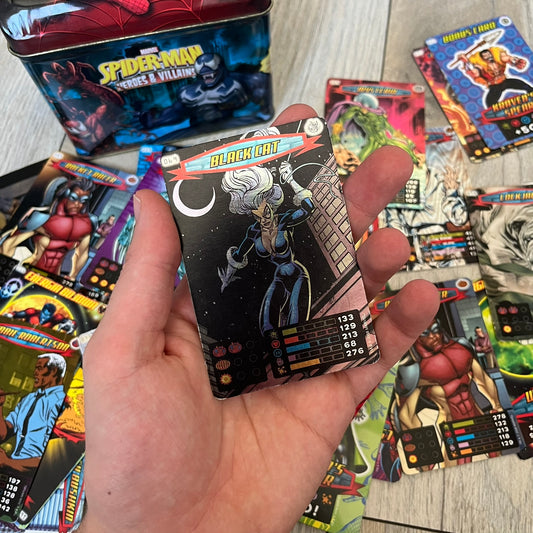 Spider-Man Heroes &amp; Villains 2008 Card Set includes a random amount of foil and standard cards, stored in a collectible metal box. Originally sold with the Spider-Man Heroes &amp; Villains Collection magazine, these cards can be collected or used to play multiple official games.