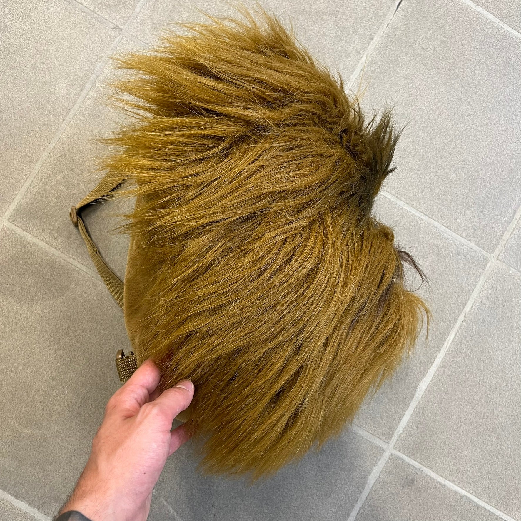  Star Wars 1990s Chewbacca Head Backpack is a novelty bag designed in the shape of Chewbacca’s head. The exterior features a furry construction with plastic eyes and a leather-like nose and mouth. It includes an adjustable shoulder straps, a single main compartment and a red Star Wars licensed tag.