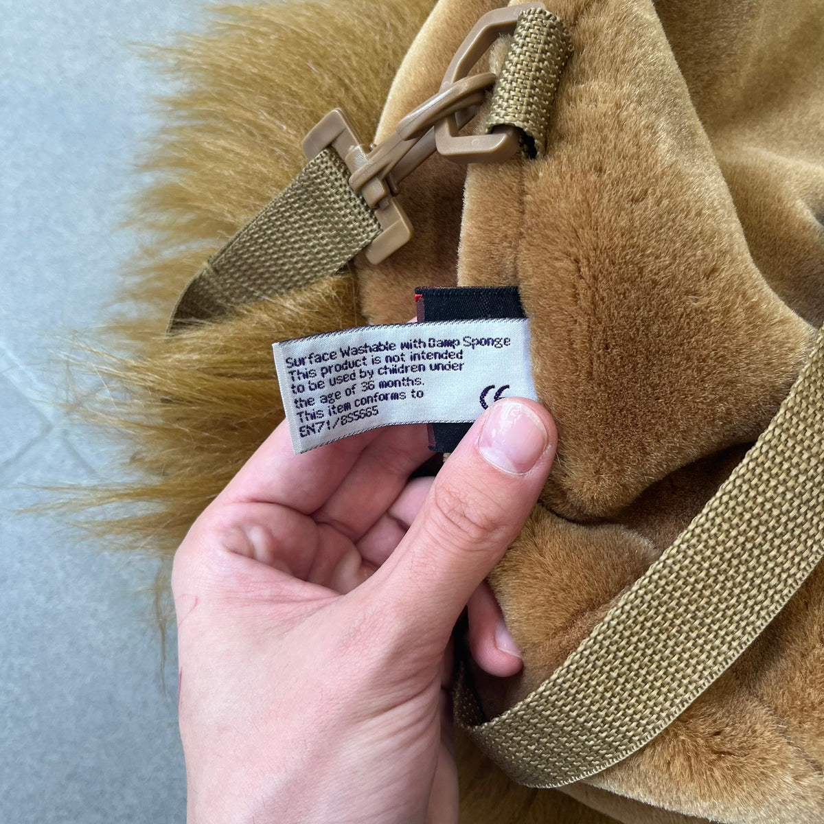 Star Wars 1990s Chewbacca Head Backpack is a novelty bag designed in the shape of Chewbacca’s head. The exterior features a furry construction with plastic eyes and a leather-like nose and mouth. It includes an adjustable shoulder straps, a single main compartment and a red Star Wars licensed tag.