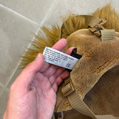  Star Wars 1990s Chewbacca Head Backpack is a novelty bag designed in the shape of Chewbacca’s head. The exterior features a furry construction with plastic eyes and a leather-like nose and mouth. It includes an adjustable shoulder straps, a single main compartment and a red Star Wars licensed tag.