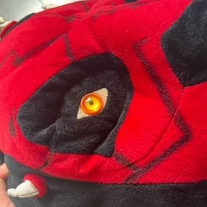 Star Wars 90's Darth Maul Head Backpack is a plush backpack shaped like Darth Maul’s head with striking red-and-black detailing and realistic plastic eyes. Features a small zip compartment on the back and adjustable straps, perfect as a collectible or standout accessory.