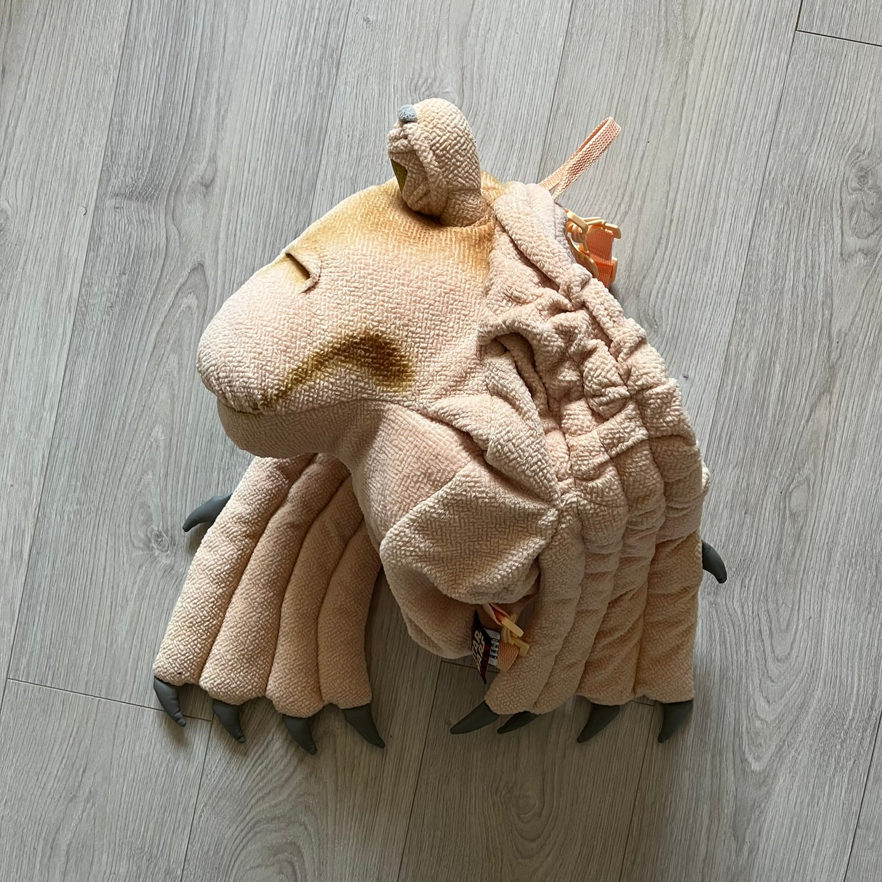 Vintage 1990s Star Wars backpack shaped like Jar Jar Binks’ head, complete with oversized ears for a playful, collectible design. This nostalgic piece captures the quirky charm of the character while offering functional storage. A rare, fun accessory for fans of classic Star Wars memorabilia.