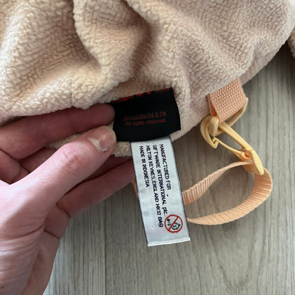 Vintage 1990s Star Wars backpack shaped like Jar Jar Binks’ head, complete with oversized ears for a playful, collectible design. This nostalgic piece captures the quirky charm of the character while offering functional storage. A rare, fun accessory for fans of classic Star Wars memorabilia.