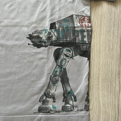 T-shirt with a robot design on a wooden surface