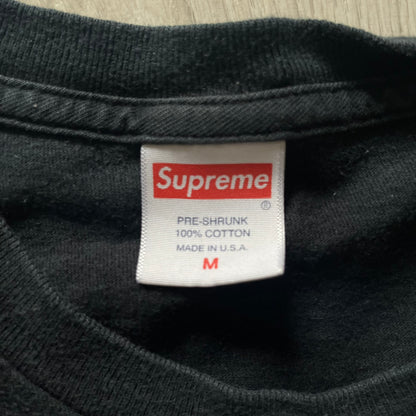 Supreme Chart SS18 Black Tee released on February 15, 2018, as part of the Spring/Summer 2018 collection. Made from 100% cotton, it features a multicolored horizontal bar graph on the front ranking “Supreme” above various themes like death, love, and money.