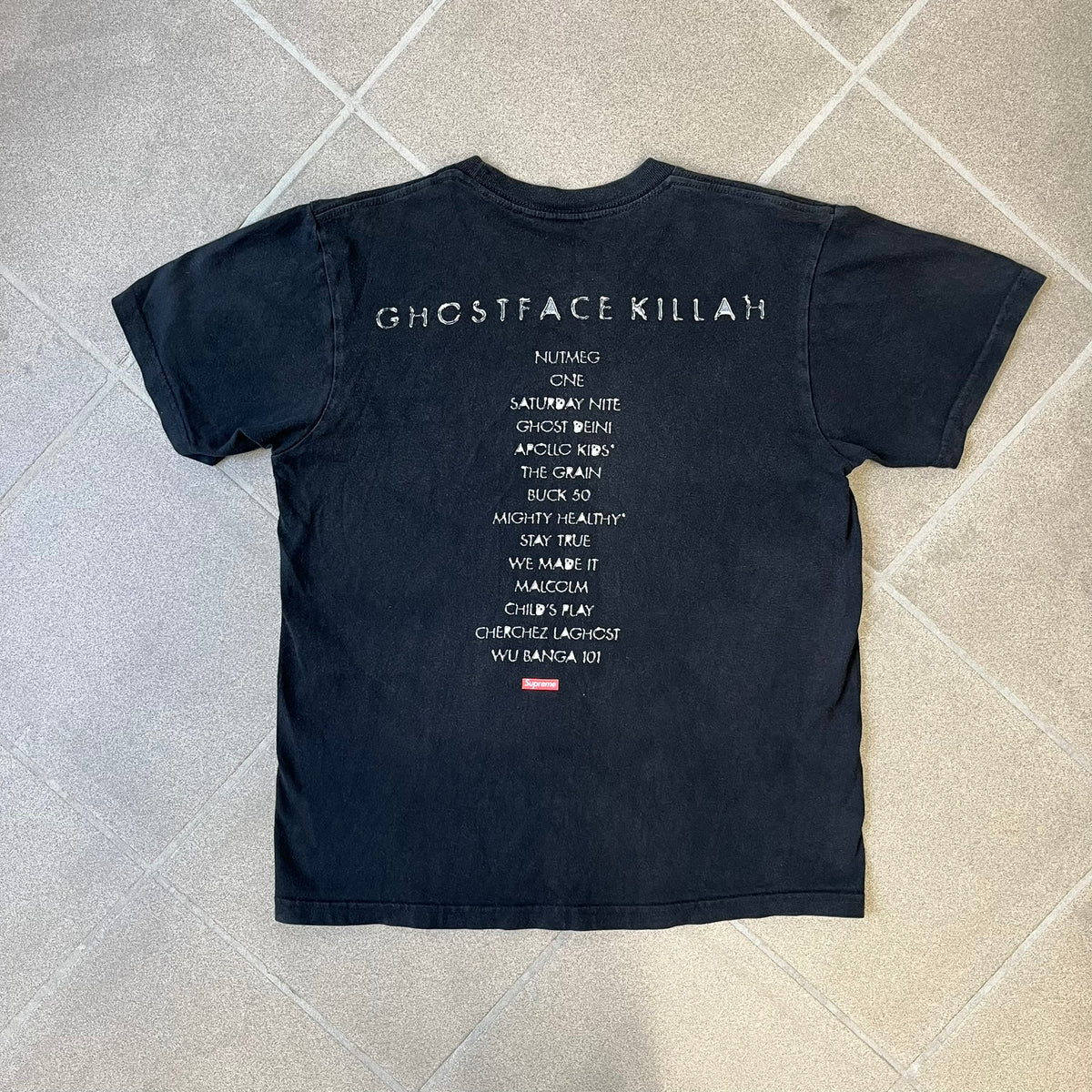 Supreme Clientele FW20 Navy Tee released in October 2020 as part of Supreme’s Fall/Winter 2020 collection. This cotton tee pays tribute to Ghostface Killah’s 2000 album Supreme Clientele, featuring the album’s iconic title graphic on the front and full tracklist on the back.