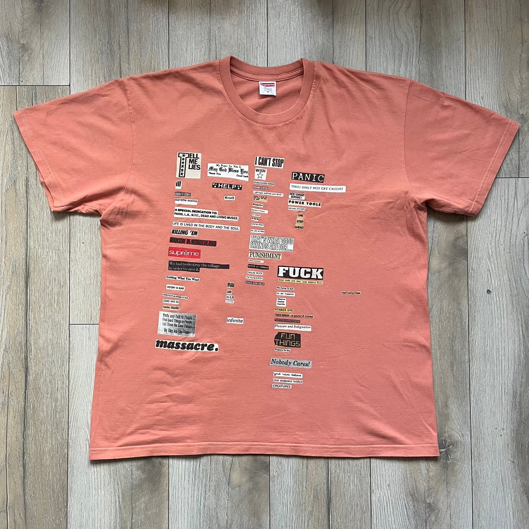 Supreme Cutouts FW18 Terra Cotta Tee is a terra-cotta colored T-shirt released on August 20, 2018, for the FW18 season. Made from 100% cotton, the front features a multicolor print composed of multiple cutouts of words and sentences. The design covers the front middle area of the shirt.