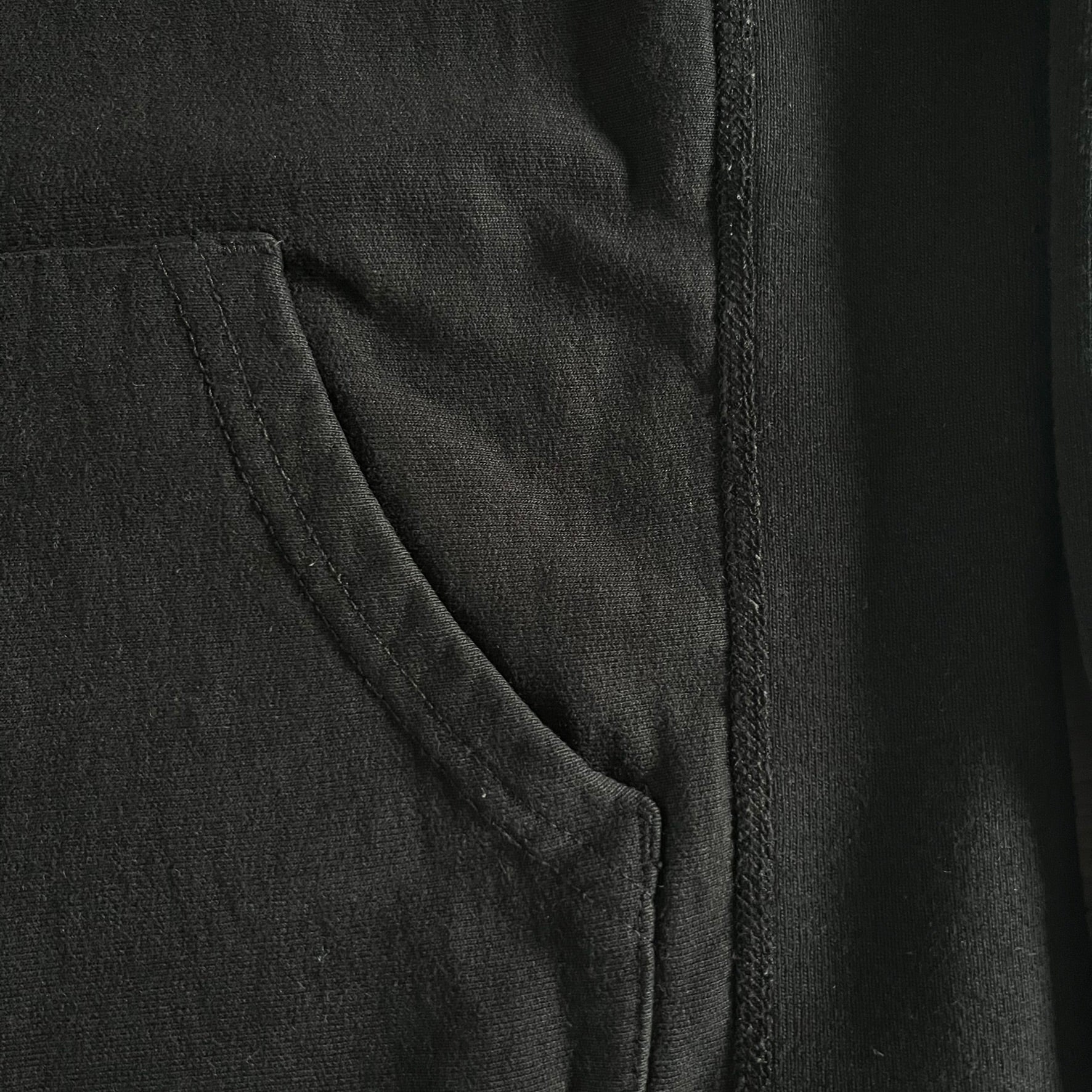 Released in Spring/Summer 2015, the Supreme Disrupt Hoodie in black features a minimalist front logo and a bold oversized back print. Made from 100% cotton, this piece delivers Supreme’s signature streetwear silhouette with durable rib-knit cuffs and hooded design.