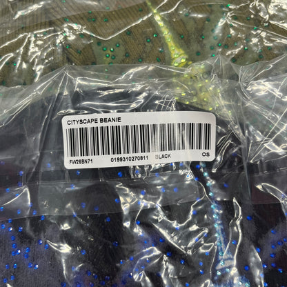 Supreme FW26 Cityscape Art Dealer Black Beanie is a black acrylic beanie with original artwork by Art Dealer, featuring a blue and white night city graphic with a moon and small stars across the sky on both sides. An old English-style Supreme logo sits on the front, and rhinestone appliqués in different sizes decorate the front and back. The print is stretchy, so any cracking effect that appears is just the print stretching with wear.