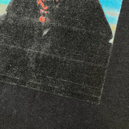 Supreme FW26 Darth Maul Sith Black Tee features a black 100% cotton T-shirt with a photo graphic of Darth Maul on a blue background. A white Supreme logo is printed above the graphic. Features a licensed Star Wars neck tag and is made in Honduras.
