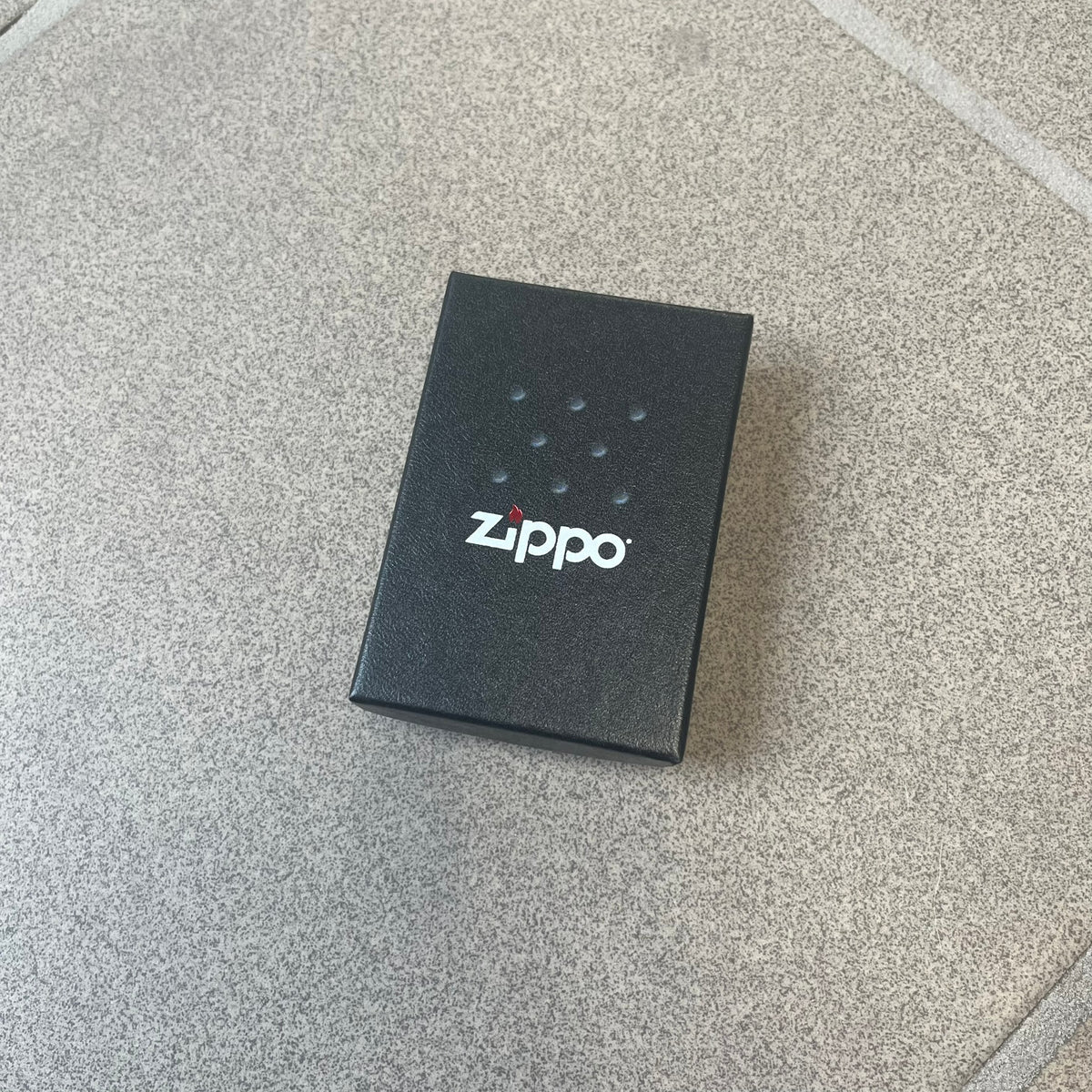 Supreme FW26 RealTree Camo Logo Zippo Lighter is an original Zippo featuring a full RealTree camo graphic with the Supreme box logo on the front. It comes with the original Zippo box and has never been filled.