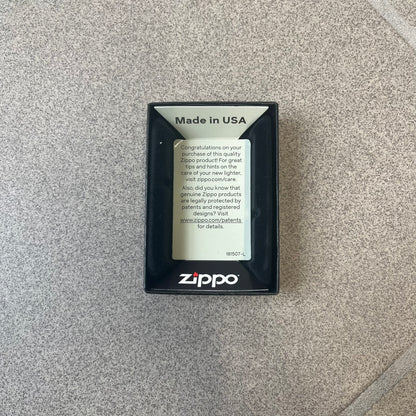 Supreme FW26 RealTree Camo Logo Zippo Lighter is an original Zippo featuring a full RealTree camo graphic with the Supreme box logo on the front. It comes with the original Zippo box and has never been filled.