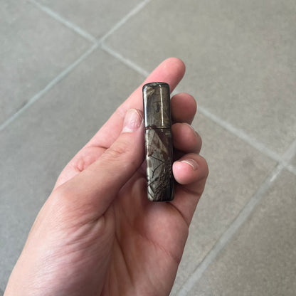 Supreme FW26 RealTree Camo Logo Zippo Lighter is an original Zippo featuring a full RealTree camo graphic with the Supreme box logo on the front. It comes with the original Zippo box and has never been filled.