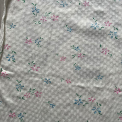 Supreme Hanes Bones Thermal Crew from FW25, crafted from 100% cotton in natural/white with black bone graphics and small floral all over print. Features a ribcage-inspired skeleton print on the front, matching arm bone designs on the sleeves, and a small Supreme logo near the hem. Released on October 23, 2025.