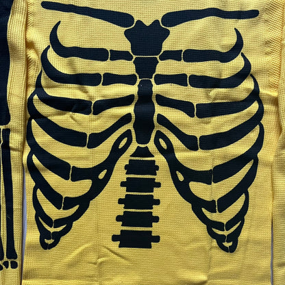 Supreme Hanes Bones Thermal Crew from FW25, crafted from 100% cotton in yellow with black bone graphics. Features a ribcage-inspired skeleton print on the front, matching arm bone designs on the sleeves, and a small Supreme logo near the hem. Released on October 23, 2025.