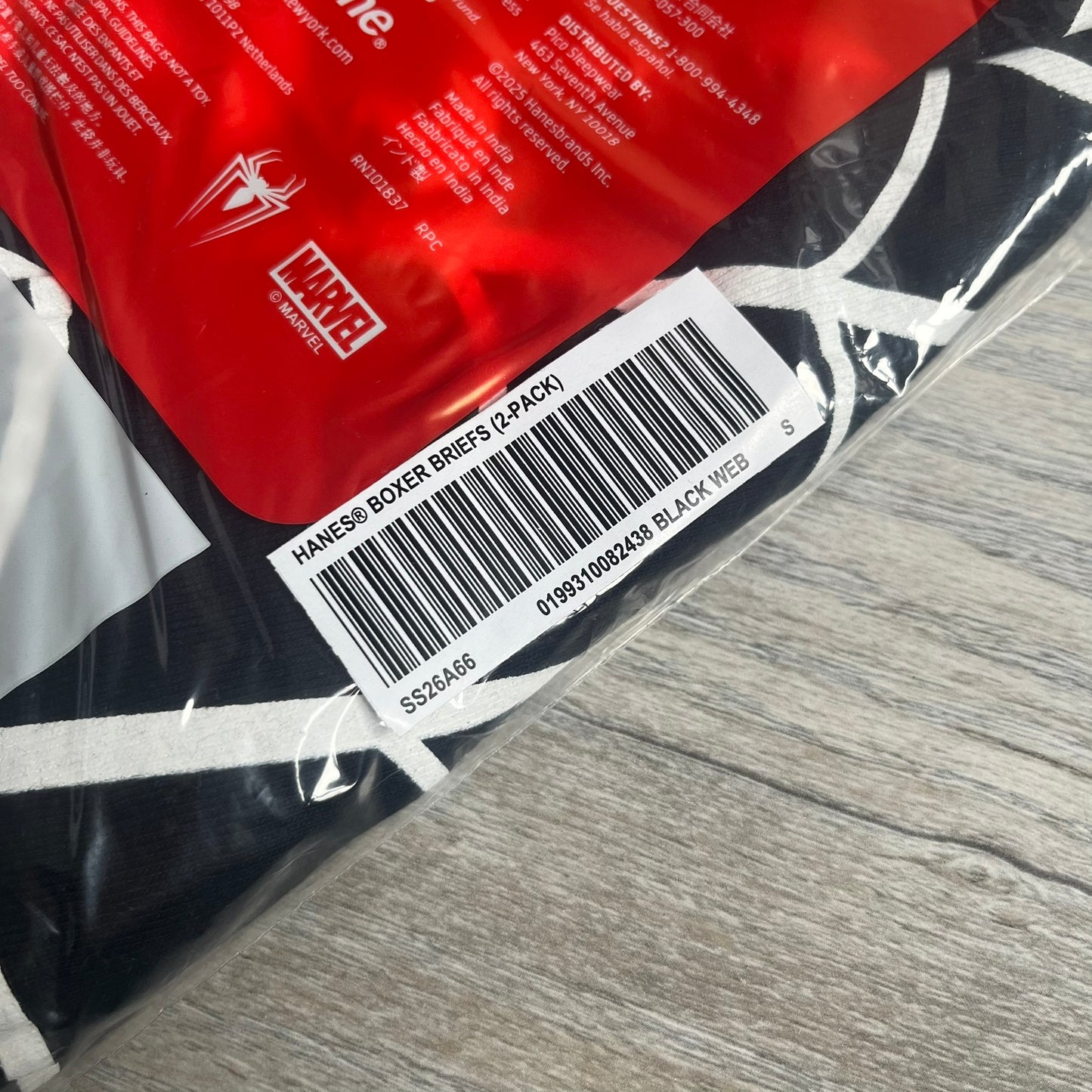 Supreme Hanes SS26 Spider-Man Black Boxer Briefs are made of cotton with a stretch fit. Features a black elastic waistband with white Supreme logo text and an all-over white web print. Classic Hanes base model a Spider-Man twist.
