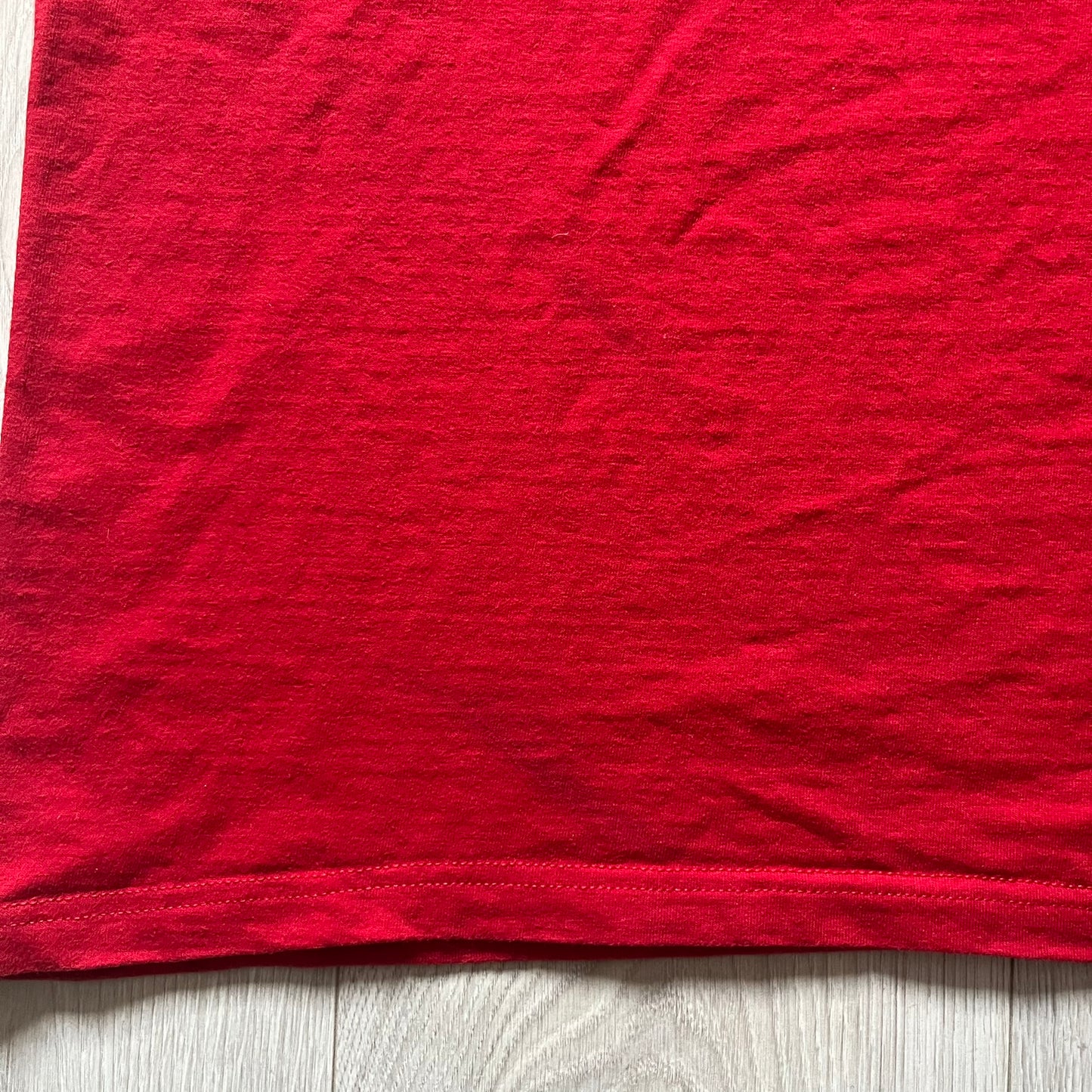 Supreme Mont Blanc Red Tee from the FW23 collection, released on October 5th, 2023 (Week 7). Made from 100% cotton, this red tee features a bold blue Supreme logo printed across the chest, with a clean monochrome back. A classic Supreme piece with a simple yet striking color contrast and casual silhouette.