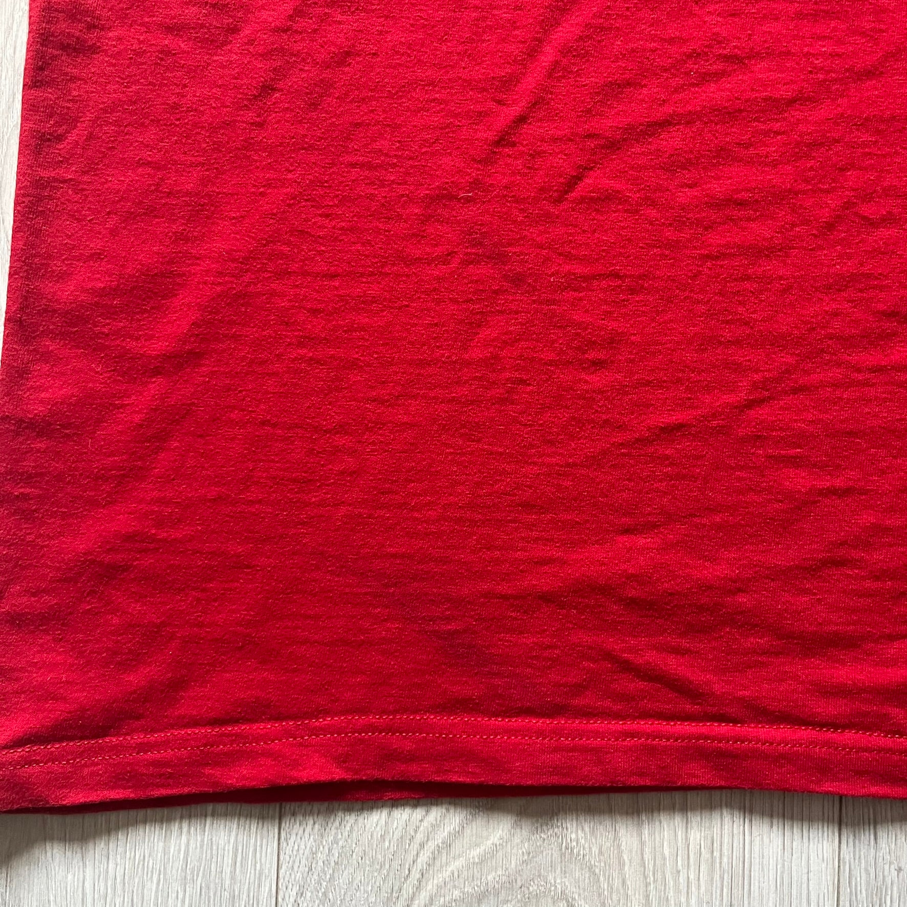 Supreme Mont Blanc Red Tee from the FW23 collection, released on October 5th, 2023 (Week 7). Made from 100% cotton, this red tee features a bold blue Supreme logo printed across the chest, with a clean monochrome back. A classic Supreme piece with a simple yet striking color contrast and casual silhouette.